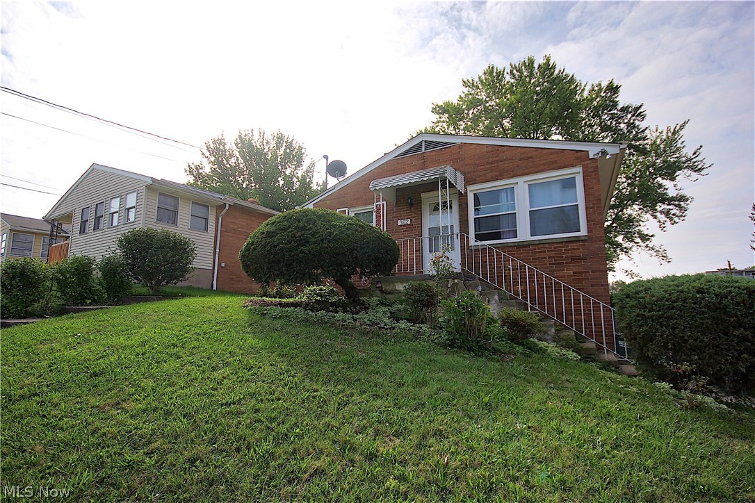 All you need to do is move in! This charming brick ranch located in Barberton local school district offers three bedrooms beautiful hardwood floors, one and a half baths, and comes with all kitchen appliances as well as a washer and dryer. Schedule your private showing today !