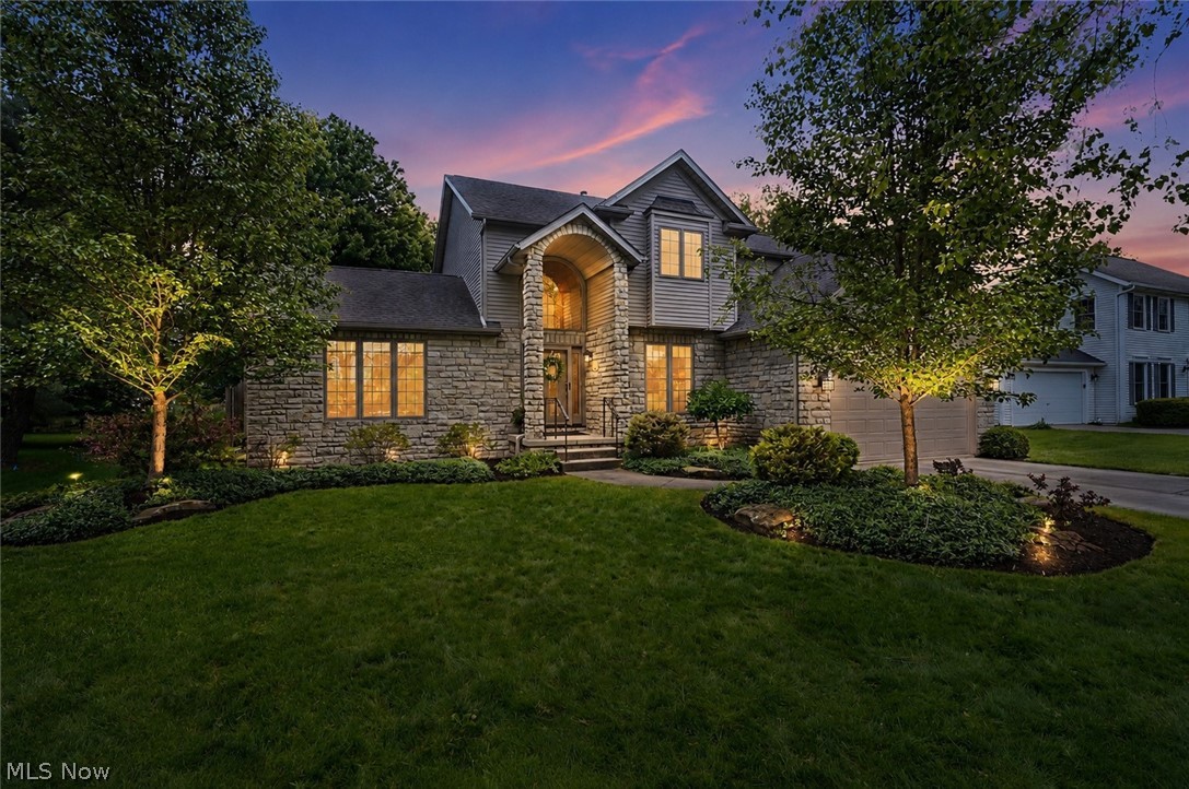 Nestled in Twinsburg’s prestigious Ethan’s Green community, this custom-built home has been loved
and immaculately maintained by the original owners. The inviting two-story foyer flows into a light filled
great room anchored by a floor to ceiling stone fireplace. The charming kitchen includes a granite
center island, hand-painted Italian tile backsplash and stainless-steel appliances. The formal dining
room can be used for entertaining or as an office space. Upstairs, the primary suite boasts a vaulted
ceiling, walk-in closet and a beautifully remodeled bathroom with custom cabinets. Downstairs you’ll
find a newly carpeted (2025) finished basement and separate workroom. Outdoors, enjoy the
professionally landscaped backyard that includes a brick patio and custom iron work by Finelli
Architectural Iron. The home has been upgraded with hardwood floors throughout, Pella windows and
exterior doors and custom blinds. Additional highlights include a security system, whole house
humidifier and air purifier, new dryer (2024), refrigerator (2025), water heater (2026) and high-
efficiency AC/furnace (2019). The home has convenient access to shops, restaurants and highways.
Elegance and comfort await you in this rare gem located in the beautiful tree-lined Gleneagles golf
course community.