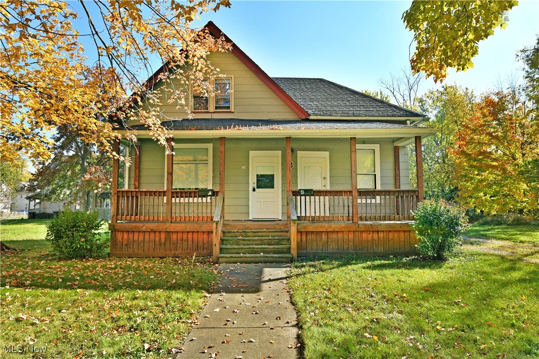 An opportunity as golden as the leaves on the trees, this freshly renovated Warren duplex awaits your next move as it resides in its gorgeous lot, exploding in fall colors. The unique layout is divided into both a single floor efficiency apartment and a traditional, two-story residence with a three-bedroom design. A covered front patio draws you near as you enter the home. The first-floor efficiency begins with a spacious great room layout, meant to encompass both sleep and living space. The tall windows spill sunshine across the hardwood styled flooring as a full bath opens along the near wall. Completing the package, a robust rear kitchen provides plenty of space for dining. Walking inside the main unit, a cozy foyer spills into a prominent living room, transitioning into central formal dining, alight with a trio of picture windows. The bonus parlor space includes a walk-in pantry as the main staircase and full first floor bath look onwards. The rear kitchen provides stylish countertops and stained wood cabinets while a fantastic rear sunroom completes the floor. Upstairs, a bonus room sits at the end of the hall for an easy office space or naturally lit storage. Shelving lines the main hallway as the trio of spacious bedrooms branch away. At the basement level, an additional full bath is located along with laundry services.