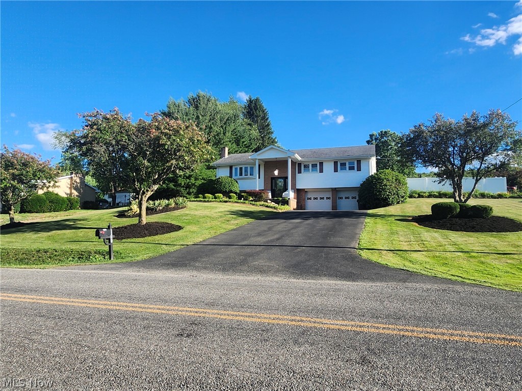 One -Owner, Meticulously Maintained Split-Level Home! Pride of ownership shines throughout this lovingly cared for home. Featuring 3 bedrooms and 2 1/2 baths, this spacious residence offers a large living room that flows seamlessly into the dining area, perfect for everyday living and entertaining. The updated kitchen boasts granite countertops and ample workspace. A stunning bonus sunroom with high ceilings provides a bright, open atmosphere and walks out to a true backyard oasis featuring a beautiful inground swimming pool surrounded by nature stone walkways and mature landscaping. The white vinyl fence gives you the privacy you want. When you end up being the home everyone wants to hang out at, you have extra square footage in the cozy family room with a fireplace. The well-manicured yard also includes a 12x16 storage shed. Ideally located in a great area within Beaver Local School District, this home truly shows how much it has been loved. Schedule your private tour today!