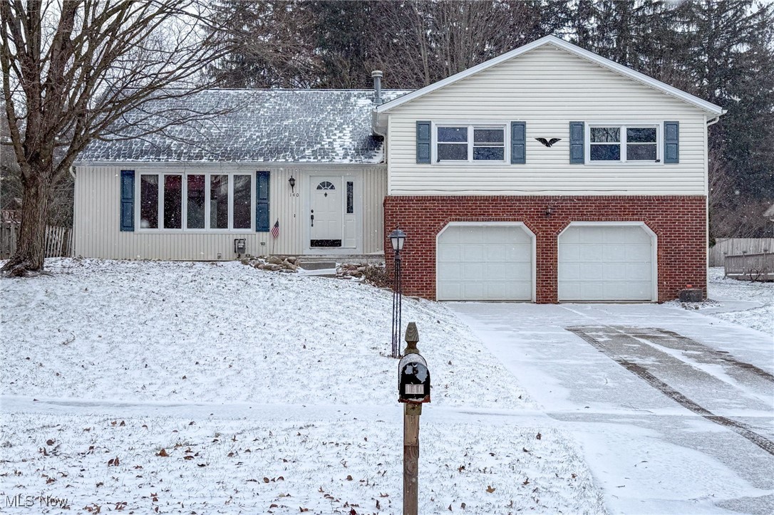 Welcome to this completely remodeled 4-bedroom, 3.5-bath split-level home in Medina, where every detail has been thoughtfully updated for modern living and peace of mind. Renovated from top to bottom in 2025, this home features a brand-new roof, a new foundation, and professional waterproofing with a transferable warranty, offering confidence for years to come.
Step inside to discover all-new interior finishes throughout, creating a fresh, cohesive look. The fully applianced kitchen shines with updated style and functionality and opens seamlessly to the living and dining spaces—perfect for everyday living or entertaining. A wood-burning fireplace anchors the family room on the lower level, adding warmth and character.
The upper level offers three comfortable bedrooms, while the third-level retreat provides a spacious bonus room ideal for a private bedroom, office, or flex space. The finished basement includes an additional bedroom with an egress window, along with a full bath—perfect for guests, multigenerational living, or a private suite.
Enjoy outdoor living on the brand-new back deck, and appreciate the convenience of a 2-car attached garage with direct access into the family room. Ideally located near the hospital and major highways, this home combines turnkey living with exceptional accessibility. Simply move in and enjoy—this Medina home truly has it all.