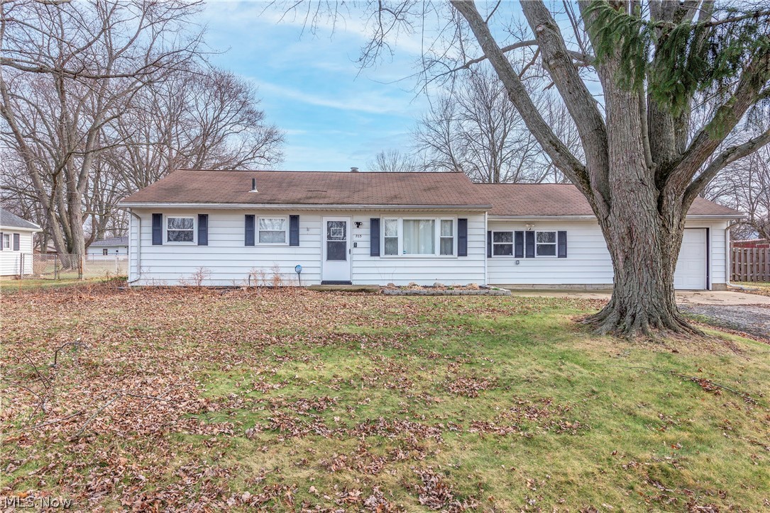 Welcome home to this beautifully updated 3-bedroom ranch situated on a spacious half-acre lot in the heart of downtown Amherst. With numerous updates including the kitchen, bath, flooring, lighting and more, this home blends modern touches with comfortable, easy living. Enjoy both a bright living room and a cozy family room, offering flexible space for relaxing or entertaining. The attached garage adds everyday convenience, and all appliances stay, making this truly move-in ready. Step outside to a large patio perfect for gatherings or quiet evenings enjoying your backyard retreat. Located close to shopping, schools, and major highways, this home offers the perfect combination of updates, space, and location.