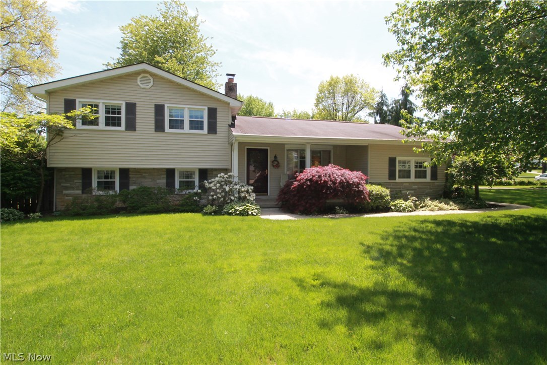 WELCOME HOME TO 4259 Carlisle Ave.! This gorgeous well cared for home has a beautiful dining room/sun room addition with lots of windows and glass door to let in all the natural light of the day. Open to the kitchen and living room, the kitchen has been completely remodeled with custom built cabinets and gleaming hardwood floors with lots of counter space and cabinets for all your kitchen needs. Large living room with bow window, and hardwood flooring is the perfect room for family gatherings and entertaining.  Upstairs takes you to a full bath, the master suite with bathroom access from the master.  There are two additional bedrooms and a very large linen closet for storage.  The lower level takes you down to the oversized family room with so much room possibly a great media room/office area as well.  There are also two large storage closets off to the side.  If you would like to go out and enjoy the outdoors there is a door for access to the outside.  The basement area has a half bat