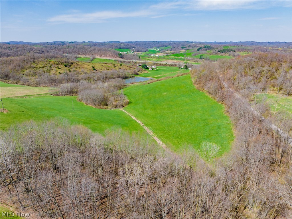Live Auction 5/27/2026 6:00 PM - Parcel 1: 8.4 +/- Acres w/ dedicated private drive - A beautiful country property set northeast of Stone Creek with rolling hills and a quality ranch home offering some of the most scenic hilltop views in the county. The ranch home features an open layout on the main floor, with a 2-car attached garage, a large kitchen and living room, large dining area, a full bathroom, two bedrooms, one with an en-suite bathroom, and the primary suite with two walk-in closets and a large en-suite bathroom. Don’t miss the 24x30 deck and the scenery it provides. The basement is partially finished, with walk-out access, it provides ample storage space, a half bath, a bedroom, and possibility for two more bedrooms. Utilities to the home include free gas forced air heat, central air, private well & septic. The land is full of opportunity, with parcels ranging in size from 6.5 to 27.9 acres offering building sites, farming, great hunting, or a solid investment, don’t miss out on this opportunity! Join us at the open house or schedule a private viewing. Please contact agents prior to walking the property.