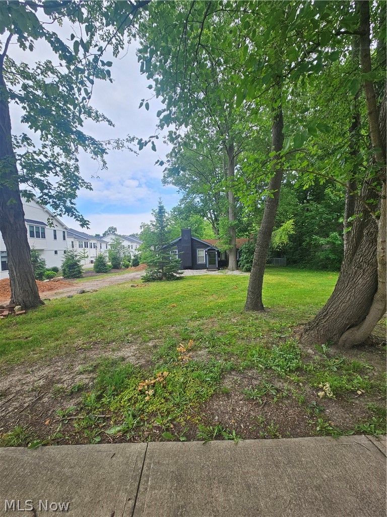 Welcome to Westlake!! 
Looking for condo style living WITHOUT HOA fees & regulations?? Complete rennovations on this 956 sq ft 2 bed, 1 bath home and enjoy all the perks of a tiny home! Built in 1930 this home offers high celings in the living room, snuggle up by a fire in the woodburner & watch your favorite movies on the automatic movie screen built in to the ceiling! Home has a large unfinished attic & 2 car garage for additional storage! This adorable cabin-like home soes need a new roof but has a new tankless hot water tank as well as a tankless boiler furnance (2023), the yard has been cleared & fully fenced in, with additional land partially cleared behind the fence leaving room to expand! Home needs all new flooring, kitchen cabinets, and some basic sweat equity! Not a fan of small home living? Take advantage of the .67 acre lot & build your dream home around the beautiful century trees on the lot! 
Come see the potential in this beautiful space!! 
*****Seller is a real estate agent - seller requires 30-60 days after close for possession.****
Selling as is.