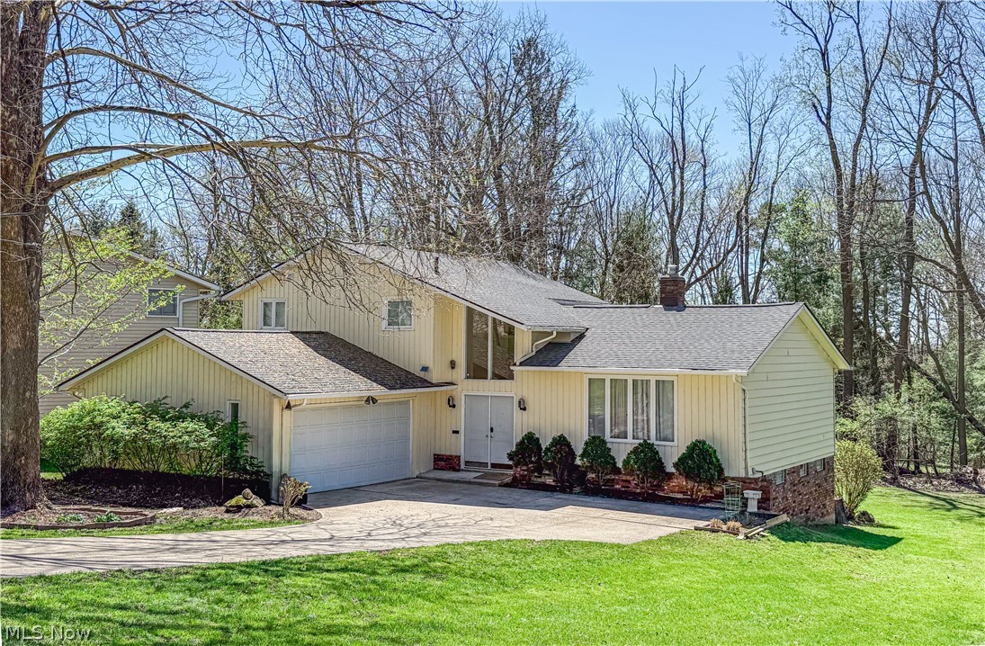 This beautiful North Solon split-level with a coveted first floor bedroom has been meticulously updated, offering modern luxury and peace of mind. From the high-ceilinged living spaces to the expansive, treed backyard, every detail has been curated for comfort and style. Interior Highlights: Open Living Spaces: A large living and dining room featuring soaring high ceilings, perfect for entertaining. Chef’s Kitchen (2025): Completely remodeled in 2025 with custom cabinetry and a high-end sink, topped off with a brand-new refrigerator . Modern Bathrooms (2024-2025): Two full bathrooms fully renovated and styled with contemporary LED mirrors. Exceptional Living & Entertaining Indoor-Outdoor Flow: The kitchen eating area opens via patio doors to a massive deck overlooking a private backyard. Cozy Family Room: Features a warm fireplace and a second set of patio doors for easy outdoor access. Finished Walkout Basement: A versatile lower level that provides additional living space and direct access to the yard. Total Peace of Mind: New Roof/Gutters/Downspouts (2024), New AC (2025), and updated exterior electrical cable lines (rusted and broken) (2025). With its extensive list of 2024–2025 upgrades and prime North Solon location, this home represents one great value!