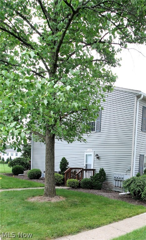 The ultimate in carefree living. Welcome to this two bedroom, one and half bath condo. Come on into the living room, and kitchen with eat in area. The bright, open kitchen has stove, refrigerator, microwave, and has a slider door to let the natural light to shine through and leads to the patio to sit out and enjoy. Upstairs has two bedrooms and a full bathroom and laundry. The finished lower level offers so much more room for entertaining, work out area, etc.  Sell your lawnmower! Precious memories begin right here!