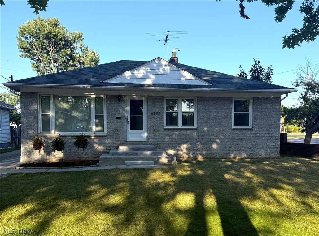Welcome home to this beautifully updated 3-bedroom, 2-bath ranch in the heart of Parma Heights! The thoughtfully renovated kitchen (2025) features a more open layout with a wall opened up to create a seamless view into the bright and inviting living room. Flowing effortlessly into the dining area, the open-concept living space is filled with natural light from multiple windows, creating a warm and welcoming atmosphere. Hardwood floors extend throughout the main level and continue into all three bedrooms, adding timeless character and easy maintenance. The main-floor bathroom was tastefully remodeled in 2023, and a second full bathroom was added in the basement the same year for added convenience. Both have LTV flooring to keep cleaning a breeze. The finished lower level offers a spacious rec room refreshed in 2022 with fresh paint, new carpeting, and updated light fixtures—perfect for entertaining, family fun, or creating a flexible living space. Nature stone flooring was installed (2022) in the laundry room and utility area adding both style and functionality. Step outside to enjoy the fully fenced backyard, where a privacy fence creates a secluded setting with plenty of space for outdoor entertaining, family gatherings, gardening, or simply relaxing. Whether you're hosting a summer barbecue or enjoying a quiet evening outdoors, this backyard offers the perfect blend of privacy and room to play. This stylish ranch is move in ready and conveniently located within minutes of restaurants, shopping, and all of the surrounding attractions. Schedule a showing and start packing!