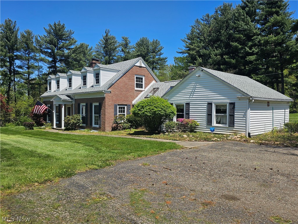 3.5-Acre Equestrian Fixer-Upper in Bath Township! Bring your tool belt and your horses! This is a rare "diamond in the rough" opportunity to sweat equity your way into a premier Bath Township estate. Situated on 3.49 sprawling, wooded acres within the Revere Local School District, this property is priced for the visionary buyer ready to restore a classic brick Cape Cod to its former glory. A restoration canvas built in 1948, this 2,058 sq. ft. brick Cape Cod has the "good bones" and character features that modern builds lack; solid brick construction with a traditional layout. Hardwood floors throughout and two fireplaces (plus a wood stove) are ready to be the focal point of a total renovation. A 24x15 living room and 20x15 family room offer the square footage
needed for a high-end flip or a dream custom residence. A standout feature is the barn; forget simple sheds, this property features a massive 1,280 sq. ft. 3-stall barn that is equestrian-ready; perfect for boarding, a hobby farm, or conversion into a high-end workshop/studio. The lot features 3.49 acres of irregular, treed terrain providing the privacy and "Park/Greenbelt" atmosphere that is increasingly hard to find in this area. Location, Location, Location -  prime corner Lot at the corner of Ghent and N. Cleveland-Massillon Rds. High ROI Potential in an area of much higher-priced estates, this fixer-upper offers significant upside. This is a true
project property with massive potential. Whether you're looking for your next flip or a private equestrian homestead, this Bath Township gem is ready for its second act.