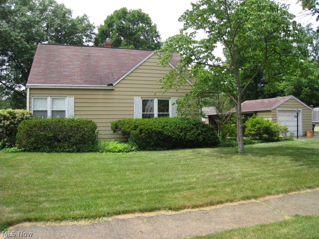Darling Ranch west of State Road on a pretty corner lot. 2010 New Furnace and Central Air. Vinyl replacement windows, newer kitchen and bathroom flooring & faucets. Front door, glass block basement windows, refrigerator and gas range/oven to remain.  Spacious living and dining.  Cute kitchen. Rich hardwood floors. Full basement.  One car garage.  Priced to sell.  Won't last!