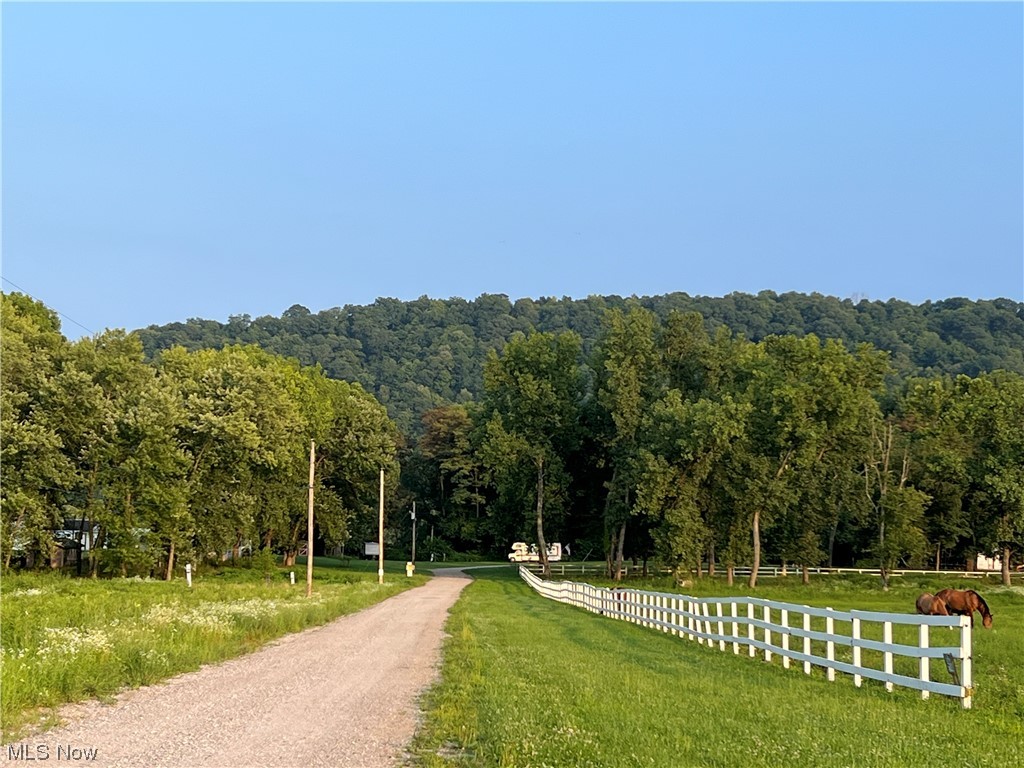 40 + or - acres (tbd with survey, This beautiful piece of property stretches from SR 7 to the Ohio River with river frontage, access, and dock!
Former campground, 100 + sites, wired for electronic to the campsites - (just needs hooked up to transformer again) no septic at individual sites, just at the buildings.  
A beautiful picnic shelter, shower house with laundry room (needs re-done), activity center with kitchen hookups, and men and women's restrooms.
This is a beautiful piece of property along the Ohio River!!!  Use your imagination!  This piece of property doesn't have to be used as a campsite, the possibilities are endless!!!