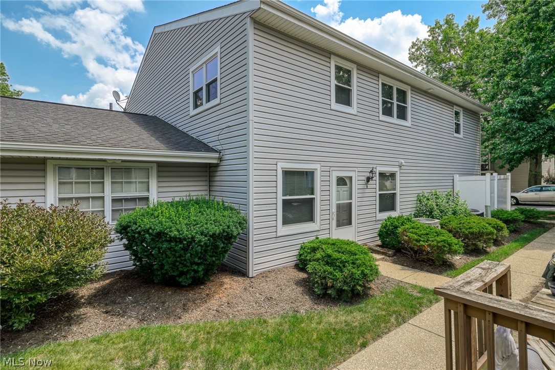 Welcome home to 2455 Island Drive! This charming condominium offers the perfect blend of comfort and convenience in the heart of Green City. Step inside to a bright, open main floor where the kitchen, dining, and living areas flow together effortlessly, ideal for everyday living and easy entertaining. The updated kitchen shines with granite countertops, and fresh paint throughout gives the whole home a crisp, move-in-ready feel. The main-floor laundry adds everyday convenience you'll love. Upstairs, you'll find two comfortable bedrooms and a refreshed bathroom, offering a peaceful retreat at the end of the day. Enjoy the ease of a one-car garage, plus access to the community pool, with peaceful views of the adjacent golf course green; it's like having a resort right outside your door. Updates completed (approximately 2018) include the kitchen, windows and carpeting. Located within the Green Schools, this home is also just minutes from shopping, restaurants, parks, and CAK airport, making both daily errands and travel a breeze. Don't miss your chance to make this inviting home yours!