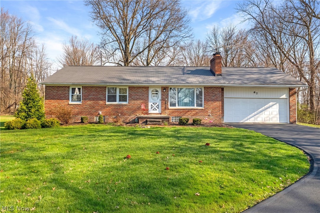 Welcome home to this charming brick Ranch set back in a serene neighborhood, close to schools and shopping. The home features gorgeous hardwood flooring throughout, large windows that flood the home with natural light, a spacious floor plan including a sizeable kitchen, dining room, living room, 3 bedrooms, and a full bathroom on the main level. The basement has a capacious finished area with a second full bathroom. You will love relaxing in the Seasons room, overlooking the beautiful backyard landscape. The attached 2-car garage enters into the kitchen for convenience, and there is a huge second garage with a built-in shed at the back of the property. This Cuyahoga Falls home in Woodridge LSD is a must-see!