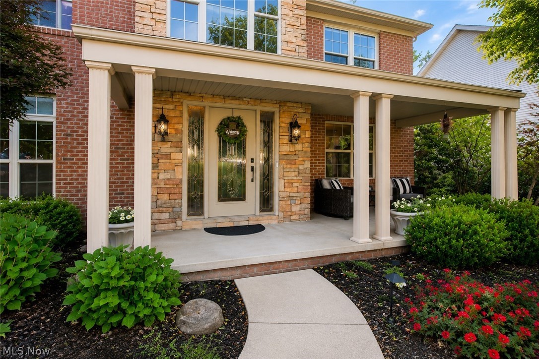 Welcome to Wedgewood—one of Copley's most sought-after communities, where tree-lined streets, a neighborhood clubhouse, community pool, and tennis courts create a lifestyle you'll enjoy long after moving day. Perfectly positioned just minutes from I-77, Route 21, Montrose shopping and dining, and everyday conveniences, this exceptional home offers the ideal balance of luxury, comfort, and convenience for today's busy lifestyle.

Step inside to an impressive two-story foyer leading to a spacious floor plan featuring formal living and dining rooms, a private office, and a dramatic great room with soaring ceilings, fireplace, and walls of windows overlooking the wooded backyard.

The beautifully appointed kitchen is designed for both everyday living and entertaining, offering granite countertops, stainless steel appliances, a large center island, an incredible walk-in pantry with a second refrigerator, and a butler's pantry with sink connecting to the formal dining room.

The luxurious owner's suite features its own fireplace, spa-like bath, and two walk-in closets. Three additional bedrooms provide plenty of space, while the expansive lower level offers endless possibilities for future living space, recreation, or a home gym.

Relax on the composite deck surrounded by mature trees and enjoy the perfect combination of privacy, convenience, and exceptional community amenities. This is more than a home—it's a lifestyle!