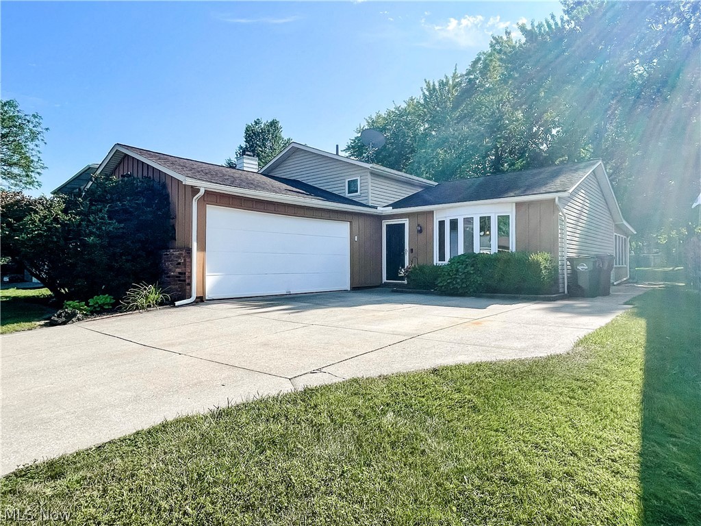 Welcome Home to this 1656 sqft 4 bedroom Split Level in a desirable Parma neighborhood featuring a breathtaking private park like backyard oasis with pool!!  This open concept floor plan boasts a generous amount of living space including a Family room, Living room, Dining area, large open Kitchen, and a 18x12 Four Season room with New A/C and Heat in 2021.  All appliances stay with the home including the washer and dryer as well.  The Samsung refrigerator is new with a warranty. This must-see home offers a wood burning Fireplace (which can heat the entire home), an attached 2 car garage, a tankless HWT installed in 2018, a newer Furnace installed in 2017, and a new garage door opener and fresh paint this year!  Enjoy the peace and relaxation created on this quiet wooded lot with a generous sized gazebo covered deck, and a 12x24 heated Pool with sunbathing deck.  The patio beyond the pool is lighted and the shed has electricity as well!  This home is conveniently located by Nike Park, schools, shopping, Tri-C college and minutes to I71, Parma Hts and Middleburg Hts. Don’t miss out...Call to see today!!