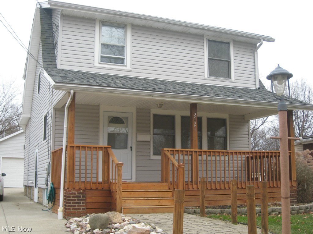 Wow!  Welcome to this beautiful, move in ready colonial with charming front porch. Great room addition with cathedral ceiling opens to remodeled kitchen with all appliances and black granite counter tops.  Formal living and dining rooms add to living space. Step out back onto the deck which extends across the back of the house. All wood trim and laminate floors.  Updated baths, windows, roof, furnace, air and electric.  Concrete drive and oversized 2 car garage.