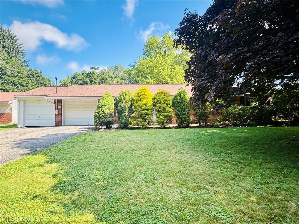 Welcome to this well-maintained brick ranch offering comfortable one-floor living! Step inside to a spacious open floor plan that's perfect for everyday living and entertaining. The generously sized living room features a large front window, while a newly installed sun tunnel enhances the natural light without sacrificing the privacy provided by the mature front landscaping.

The kitchen is functional, featuring gorgeous cabinetry, a breakfast bar, generous counter space, and pantry cabinets that provide excellent storage. The open layout flows into the dining area, highlighted by a large bay window that adds charm to the space.

The home offers 3 bedrooms and 2 full baths, including a spacious primary bedroom with direct access to a full bath for added convenience. Two additional bedrooms and a second full bathroom provide flexibility for guests, a home office, or everyday living.

Recent updates include a new roof (2026), two new sun tunnels (2026), updated bathroom flooring, and a hot water tank replaced in 2023. The solid brick exterior provides timeless curb appeal and low-maintenance durability.

Step outside to enjoy the fenced backyard and covered composite deck that creates the perfect space for relaxing in any weather. Existing above-ground pool decking remains, providing a great opportunity for a new pool or expanded outdoor living space. A shed offers additional storage while two separate single-car garages provide flexible space for parking, hobbies, or a workshop.

Located just minutes from State Route 43, Tallmadge Road, Interstate 76, shopping, dining, downtown Kent, and Kent State University, this home offers easy access to major commuting routes and everyday conveniences.

Whether you're looking for your first home, downsizing, or seeking easy one-floor living, this wonderful brick ranch offers comfort, updates, and convenience. A one-year home warranty is included for added peace of mind. Schedule your private showing today!