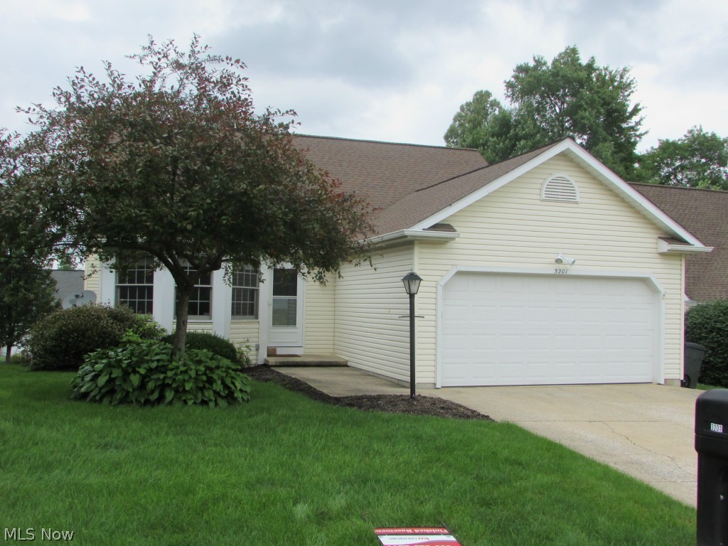 An exceptional Free Standing condo with a finished walk out basement.  The master suite is on the first floor, with the remaining bedrooms in the lower level.  There is a full bath and family room in the lower level as well.  The large eat in kitchen has been updated.  The 18x18 living room has vaulted ceilings, and opens to a huge deck overseeing the patio and woods.  An attached 2 car garage, first floor laundry, additional storage, and much more.  Possible Lease Purchase or Assumable Mortgage.