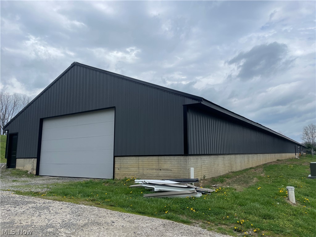 5,520 Sq. Ft. + additional 3,000 Sq. Ft. flexible use space available. Versatile warehouse space available in Sugarcreek offering multiple layout options to fit your needs. The primary space includes a 40’ x 138’ area totaling 5,520 square feet, ideal for storage, light industrial, or business operations. An additional 40’ x 75’ (3,000 sq. ft.) area is also available, located separately within the building. Both spaces feature in-floor heat and separate electric service, providing efficiency and convenience for tenants. A shared restroom is located between the spaces and will be shared with an existing tenant in the middle unit. Conveniently located just off State Route 93, this property offers easy access for day-to-day operations. Ownership is open to improvements, including the potential installation of a loading dock to better suit your needs. Take a look at this great opportunity to secure functional warehouse space in a strong location with flexibility.