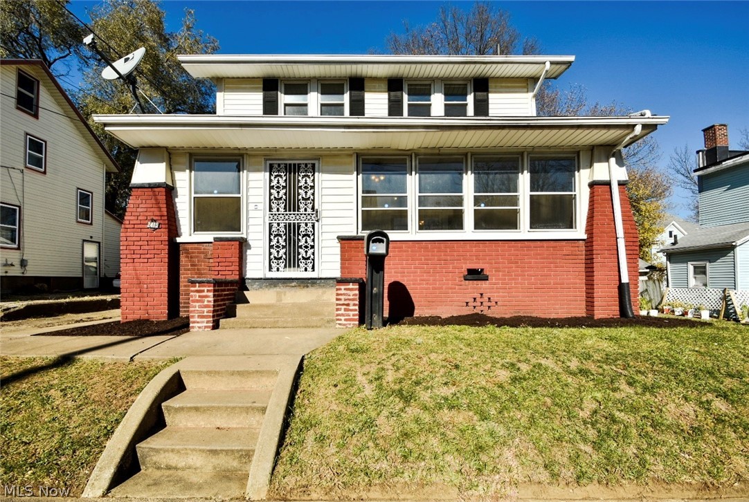 Very large updated Two Story. Updated kitchen & bathroom. New flooring on first floor. Newly painted throughout. First floor has living room with possible family room/office. Large enclosed front porch, shed, glass block windows, lots of built-ins for storage. Nothing to do, but move in.  Call me regarding down payment assistance and closing cost assistance through Canton City - convenient location - bathroom has been updated