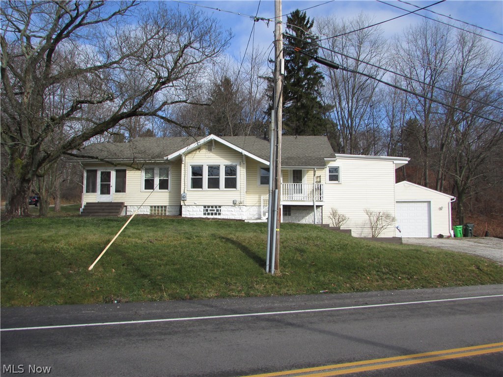 A remarkable 3, possible 4, bedroom ranch with a finished walk out basement.  Sitting on 3/4 acres, this lovely home features a master suite that walks out to the deck.  The galley kitchen opens to a huge formal dining room.  The formal living room has wood floors, and opens to a screened porch.  The basement has a 22x11 rec/family room, as well as an office or 4th bedroom.  A 24x20 2 heated garage has a 10 foot door.  An attached shed, huge laundry room, plenty of storage, partially fenced yard, and so much more.  Possible Lease Option!