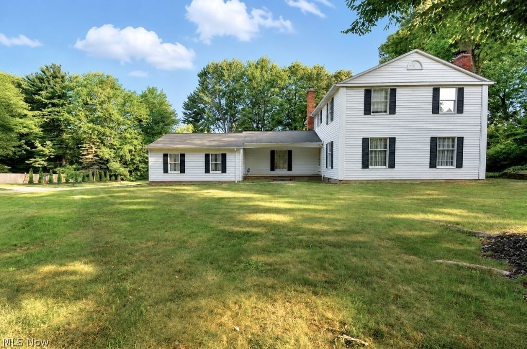 Welcome to a home where timeless colonial charm meets modern luxury! Situated on a desirable corner lot in an established neighborhood, this beautifully updated 4-bedroom, 2.5-bath home offers the perfect blend of style, comfort, and convenience—just minutes from shopping, dining, parks, and everyday amenities. From the moment you step inside, you'll appreciate the attention to detail and quality craftsmanship throughout. The stunning, fully remodeled kitchen serves as the heart of the home, featuring gorgeous granite countertops, custom cabinetry, updated lighting, and a complete suite of brand-new appliances. Whether you're preparing a weeknight meal or hosting family and friends, this space is designed to impress. The updates continue throughout the home with beautifully renovated bathrooms, including a luxurious primary suite featuring a spa-inspired walk-in shower complete with a quartz bench—creating the perfect retreat at the end of the day. Peace of mind comes standard with extensive mechanical updates completed in 2021, including updated electrical and plumbing throughout the home. New flooring flows seamlessly from room to room, creating a fresh, cohesive feel that complements every space. Cozy up beside one of two gas fireplaces during the cooler months, or enjoy the spacious layout that offers the flexibility today's buyers are looking for. Every room has been thoughtfully refreshed while maintaining the warmth and character that make a house feel like home. If you've been searching for a home that combines classic curb appeal with high-end updates and true move-in-ready convenience, your search ends here. This is more than just a beautiful home—it's one that's been meticulously improved, lovingly maintained, and is ready to welcome its next owners.