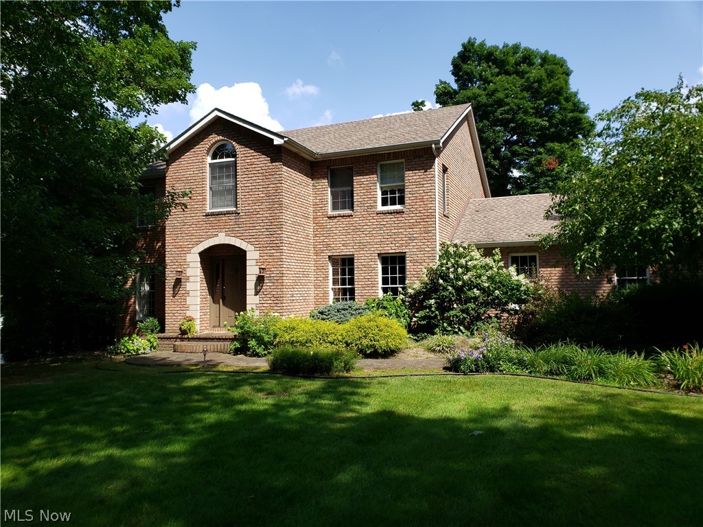 This one owner, all brick home, lovingly cared for, is a classic center hall colonial located in a park like setting on a 1+ acre lot.  As you enter from the flag stone porch and walk, you will quickly recognize you are in a custom designed home. The spacious foyer, flanked by an office and formal living room welcomes any visitor. The functional, open floor plan, blends the kitchen, family room, and formal dining room that is perfect for family gatherings and entertaining. The family room features a custom designed stone fireplace and oak entertainment center. The french doors bring in nice light and access to the three tiered deck that overlooks a neighboring pond and beautifully manicured backyard enjoyed in all seasons. The first floor laundry is conveniently located steps away from the gourmet kitchen with prep island. All bedrooms are ample sized with large closets and loads of storage space. The master bedroom and bath are nicely updated with newer carpet and flooring. The master