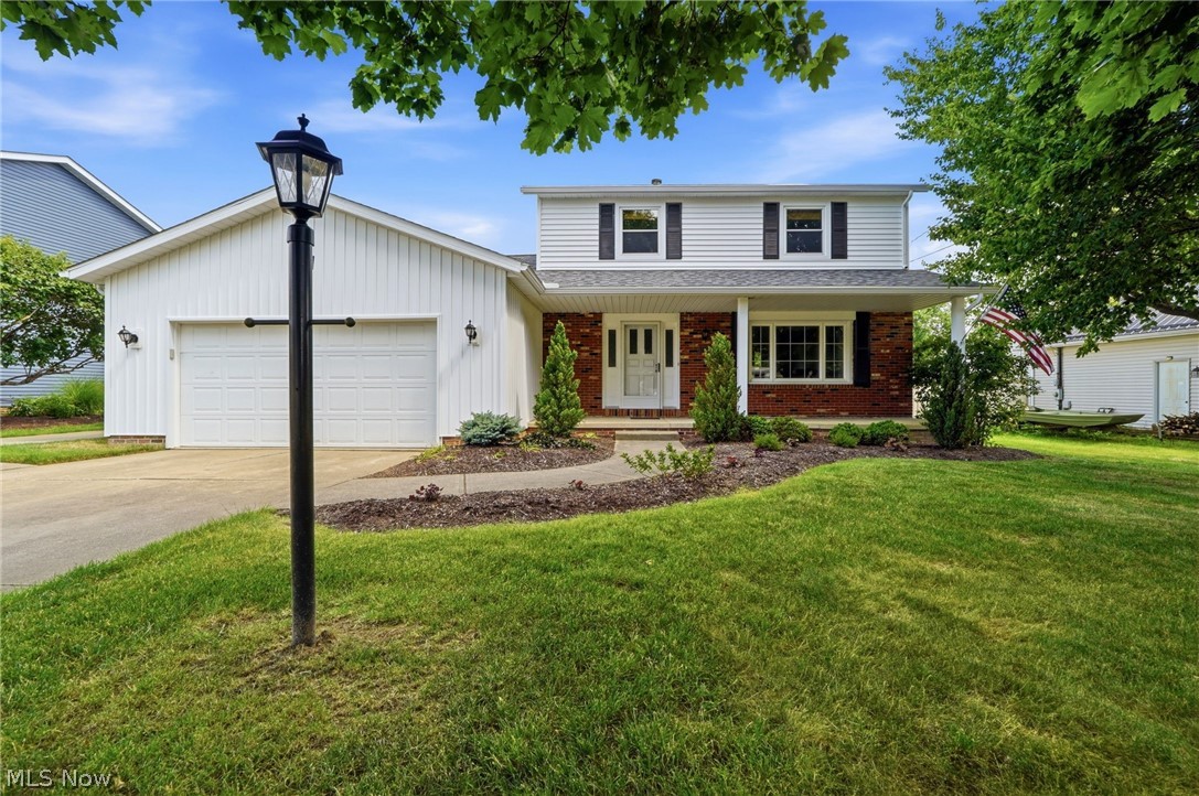 Welcome to this meticulously maintained 3-bedroom, 1.5-bath Colonial offering 1,874 square feet of comfortable living space on an exceptional 75 x 444 lot in desirable Strongsville. This well-cared-for home features an attached 2-car garage plus a 22 x 22 detached 2-car garage, built in 2007 with a concrete floor, offering exceptional space for vehicles, a workshop, hobbies, or additional storage.

The welcoming floor plan features a bright formal living room, formal dining room, and a spacious family room with a beamed ceiling and a wood-burning fireplace with insert. The eat-in kitchen offers abundant cabinetry, ample counter space, and laminate flooring (approximately 2021) that extends into the convenient first-floor laundry room. A first-floor half bath completes the main level.

Upstairs, you'll find three generously sized bedrooms, including a spacious primary bedroom with access to the full bath. The full basement has been drywalled, providing excellent storage and the opportunity to easily finish additional living space to suit your needs.

Step outside to enjoy the expansive backyard with mature trees and plenty of room for entertaining, gardening, recreation, or simply relaxing. The impressive 75 x 444 lot offers a rare amount of outdoor space, while the long concrete driveway provides easy access to both garages.

Major updates include roof and vinyl siding (2025), furnace and central air (2024), hot water tank (2025), and laminate flooring in the kitchen and laundry room (approximately 2021).

Offering four garage spaces, numerous recent updates, a spacious lot, and a desirable Strongsville location, this home is ready for its next owner. Schedule your private showing today!