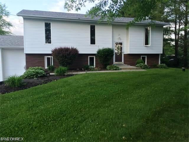 Rare find!  4 bedroom home with oversized 2 car garage, deck + patio, and huge yard! This gem has been absolutely updated from top to bottom. Major updates include: kitchen, both bathrooms, roof, central air, siding, windows, electric panel, carpeting/paint, well equipment, and hot water tank! Tastefully decorated throughout, you will fall in love with the spacious kitchen (matching stainless appliances included!) w/ample counter/cabinet space, and dining area w/ceramic flooring.  The floor plan boasts both a formal living room, and family room complete with wood burning stove, as well as a separate rec or play room! Even the laundry room is bright and airy! This home has so much to offer and so little to do you will have to see it to believe it! Possible 0% down financing!