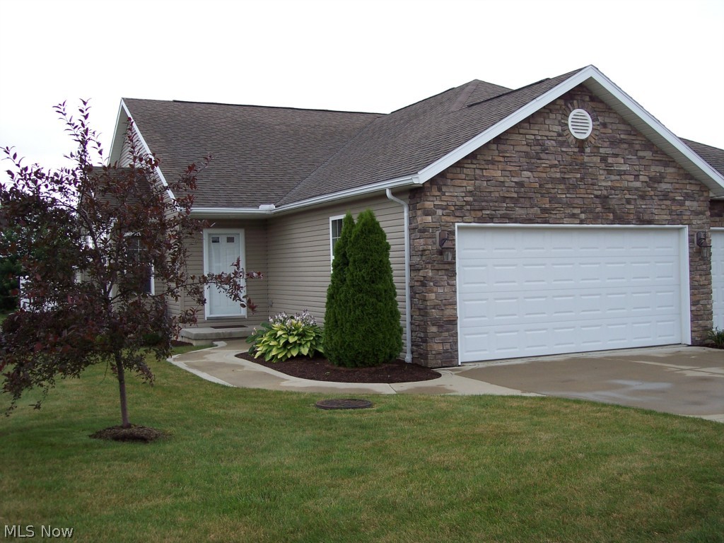 This condominium was built in 2008 and is like new! The kitchen features granite countertops and birch cabinetry with pull out drawers. The living room has a gas fireplace and opens onto the outside deck. The spacious master bedroom is on the main floor and is complimented by a master bath with double sinks and a walk in closet. A fully finished walk-out basement, including a third bedroom and an additional full bath. Condo living at its finest!