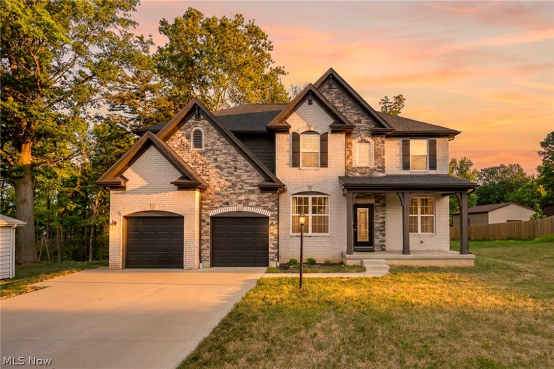 Welcome home to this exceptional recently built 5-bedroom Colonial nestled on a picturesque 2-acre lot in the heart of Strongsville, Ohio. Thoughtfully designed with timeless architecture and modern finishes, this home offers the perfect blend of elegance, comfort, and space. Step inside to discover a bright, open floor plan featuring soaring ceilings, expansive windows, and refined details throughout. The gourmet kitchen is a true centerpiece, complete with premium appliances, custom cabinetry, a large center island, and seamless flow into the inviting family room—perfect for entertaining or relaxing by the fireplace. Upstairs, you’ll find four generously sized bedrooms, including a luxurious primary suite with a beautiful master bathroom and spacious walk-in closet. The additional bedrooms offer flexibility for family, guests, or home office space. Outside, the expansive 2-acre property provides privacy and endless possibilities—create your dream outdoor retreat, add a pool, or simply enjoy peaceful evenings overlooking your own private oasis. Located just minutes from top-rated schools, shopping, dining, parks, and major highways, this home combines serene living with unbeatable convenience. This is a rare opportunity to own a beautifully crafted colonial in one of Strongsville’s most desirable locations. Schedule your private showing today!