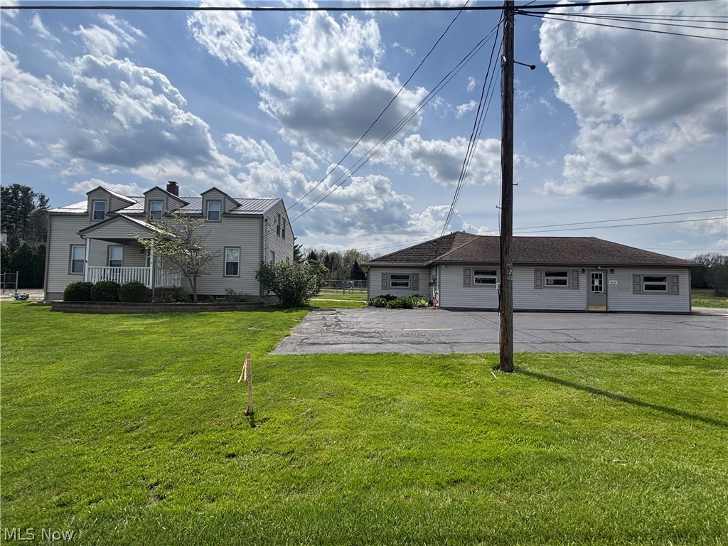What an amazing opportunity. This free standing office building features a kitchenette, bathroom, 5 office spaces and so much more.
In addition to the office building the property has a well maintained home that is currently being used as a rental  property.
The house has 3 bedrooms, kitchen, dining, living room, 1 full bath, 1/2 bath,  first floor laundry hookup, and a bonus room.  
The building and house sit on just under 2 acres just outside of the village of Garrettsville. Plenty of parking at the office building and even more in the fenced area. Do not walk the property without an agent. 24 hour notice required.
Room dimensions (House) Kitchen 11X11, Dining 10X14, Living 12X14, 1/2 Bath 6X5, Full bath 12X7, Bedroom (1st floor) 11X9,
Bedroom 10X15, Bedroom 10X15, bonus/office space 9X12.
Do not walk the property without your agent. 24 hour notice required. Listing agent will be present for all showings.
