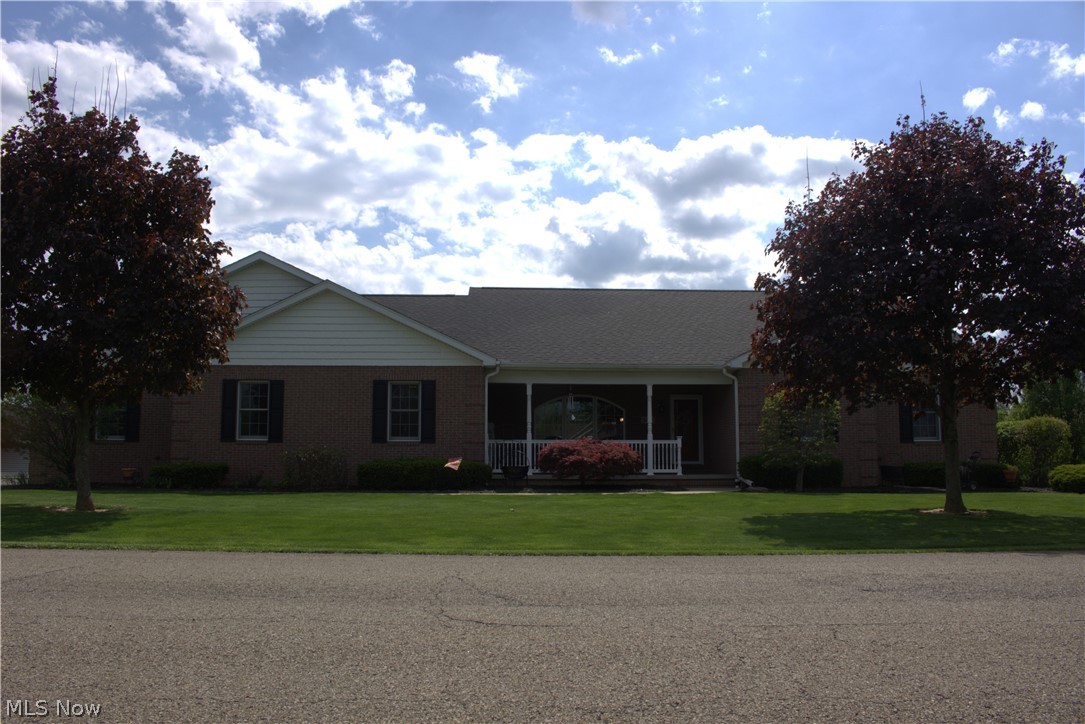 Must see to appreciate all the details in every room. This is your chance to own a custom-built home in a quiet neighborhood with easy access to I-70 and 40. This home has Amish woodwork throughout the entire home including beautiful flooring and cabinets. Peaceful views from all season room off of the dining area. 3 Bedrooms/ 2 Baths on the main floor with a home office and a laundry as well. The walk out basement has 2 additional bedrooms, full bath, living area with a complete kitchen!!! Very large storage area with tons of shelving and easy access to newer furnace / hot water tank. The builder thought of everything including, 2 attic entrances with walk through and lighting, separate heating unit in 3 car garage, 1 foot of insulation in ceilings, all interior walls insulated, 4-foot-wide hallways and all doorways are 36 inches wide. Many updates in the last 3 years including the roof, siding, storm doors and exterior doors. This home has 2 electric services, 1- 100 amp and 1- 200 amp. 1- 25K KW natural gas generator. 
All you need to do in move in! Contact your Realtor to schedule a showing.