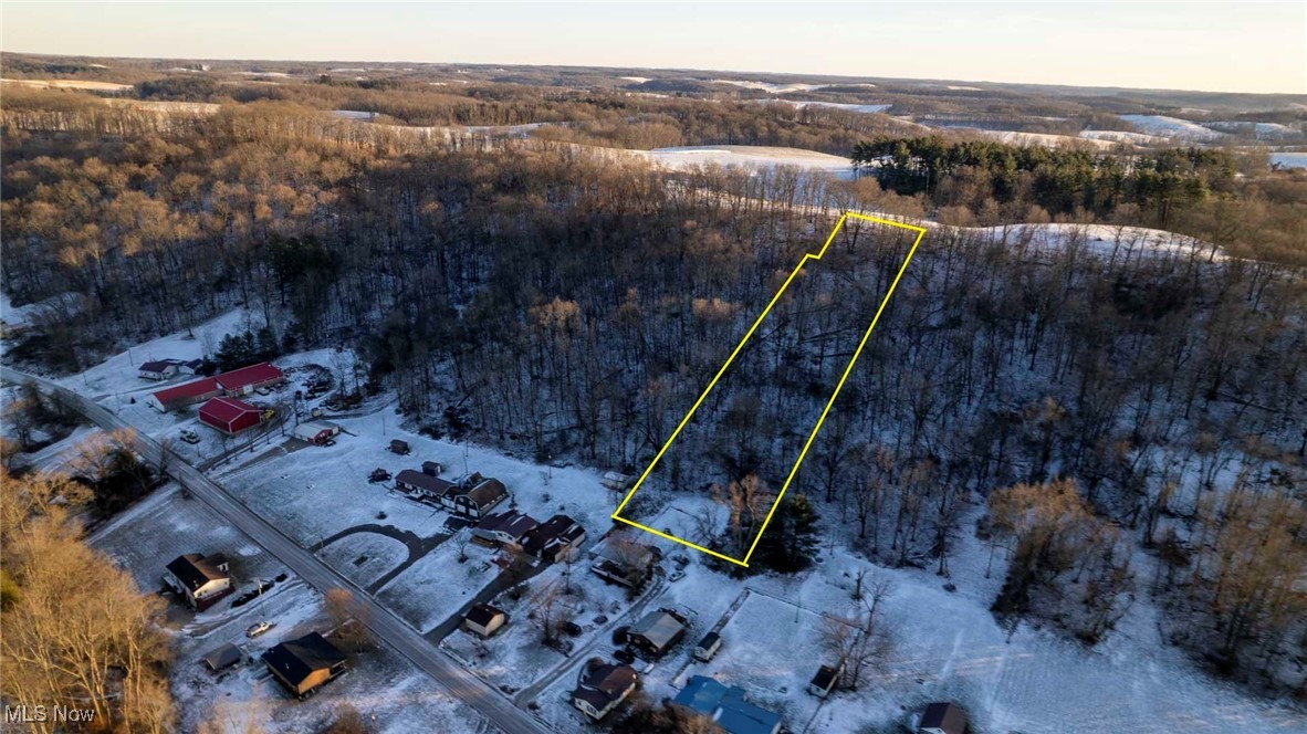 Vacant land with a recently updated survey ready for your improvements!