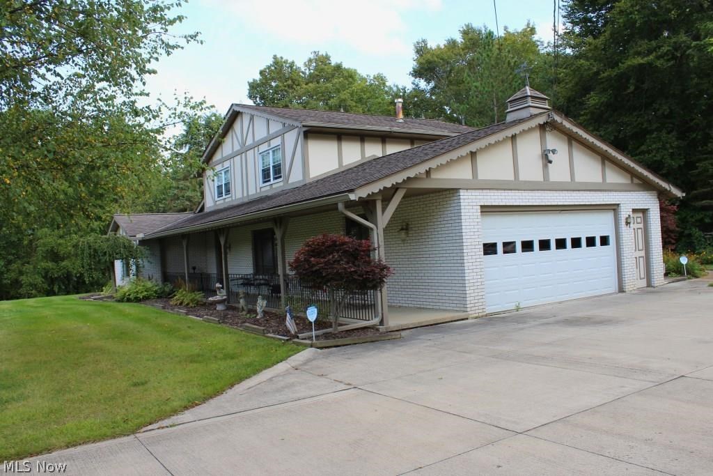 209 Logan Road, Mansfield - This 3 bedroom, 3 bathroom tastefully updated home is conveniently located to all parts of town. Situated just minutes from St. Rt. 42, St. Rt. 13, and I-71; everything is just minutes away – you can be to snow trails or Mid-Ohio sports car course in less than 10 minutes. This home has everything you've been looking for; brick & cedar exterior, newer roof, updated electric, hardwood floors, huge kitchen, oversize master bedroom with double sinks and 3 closets; crown molding, slate floors, huge 35’ long covered front porch, alarm system, automatic whole home generator, large private patio, 4 season room, and 2 outbuildings. Call today for your private showing!