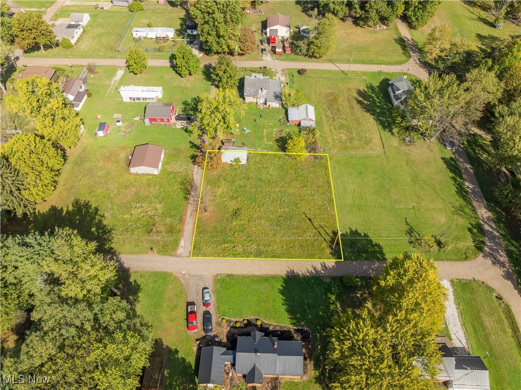 Corner Lot Opportunity in Washington Township! Discover the perfect spot to build your dream home on this .33-acre corner lot located in the Marlington School District. The property includes a 1-car garage and offers plenty of space and potential for new construction. Enjoy peaceful township living with convenient access to nearby shopping. A great opportunity to create the home you’ve always envisioned! Buyer to do their own due diligence on land use.