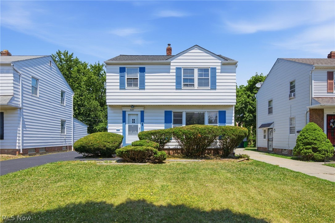 Welcome home to this charming, beautifully updated South Euclid colonial! Located right in the heart of the neighborhood, this spacious residence has been freshly painted throughout. On the main level, the bright and open living and dining rooms showcase classic hardwood floors, flowing effortlessly into a large, family room. Complete with built-in desk space and cabinetry, this den is equally perfect for cozy family gatherings or a dedicated home office. The eat-in kitchen boasts updated countertops and  cabinets, and a lovely breakfast nook for morning coffee or family meals. Upstairs, you will find three generously sized bedrooms, all featuring classic hardwood flooring, alongside a clean full bathroom. The expansive finished basement offers even more living space, featuring plush new carpet across an open recreation area and a separate bonus room that makes an ideal hobby space or second home office.  Updates include new roof, new garage doors  (2026).