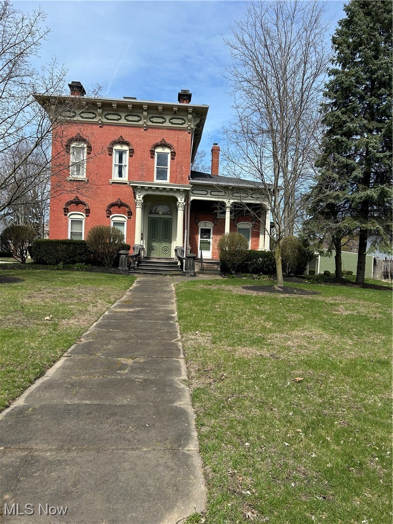 This beautiful 6 unit all brick apartment house featuring 3 two bedroom and 3 one bedroom units, all with tall ceilings and spacious layouts. New windows installed in 2010, new furnaces for each unit in 2014. All units have a garage with opener and electricity paved floor. There is one additional parking space per unit on paved parking lot. Each unit has access to basement storage area that is accessible from inside the building. All utilities are metered separately. The owner pays for trash removal. The carriage house is a 40' x 30' two story building with 8' 4" sliding door and a 18' x 24' attached garage with a opener. Make sure to have your agent set up your appointment to visit this Historic Gem! Bus stop in the front of the property, and walking distance to Lake Erie College. Easy access to the freeway for those commuting to work.