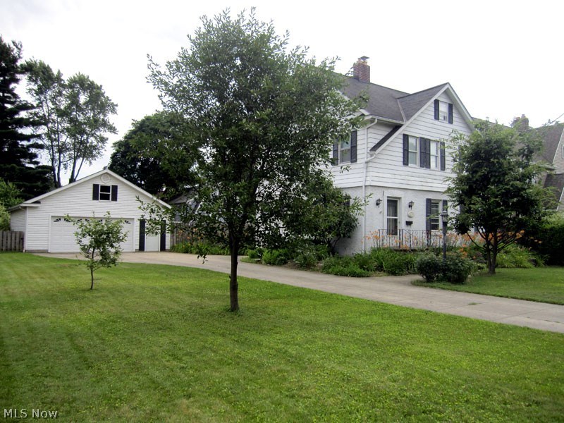 This is a well maintained and absolutely charming century home with important updates. There are two "side by side lots making for a great curb appeal. The newer oversized garage has actually housed for 4 cars and watering gardens. There's hardwood floors throughout, including the kitchen. The huge country kitchen has a free standing pantry unit that stays with the property. This seller added central air in 2014. Seller also added French doors in dining room that leads to incredibly beautiful back yard. The yard is completely fenced and the gardens are charming and have a Zen feeling. The furnace was replaced in 2016. There is an unbelievable 3rd  floor that could be the master bedroom. This owner uses mostly for crafts. This property is loaded with storage and is in the perfect location in the Falls. Enjoy Cuyahoga Falls utilities and amenities. The home comes with 1 year warranty with America's Preferred.