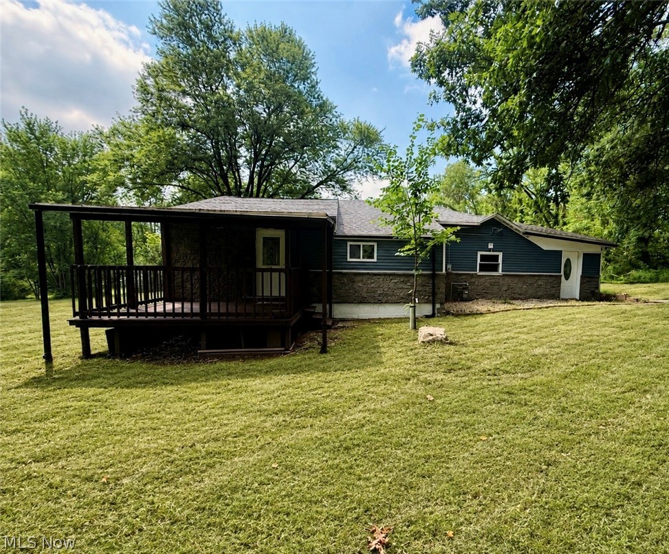 Situated on an impressive 1.48-acre lot offering plenty of outdoor space, privacy and possibilities. The home features inviting living areas, a functional kitchen and 2.5 bathrooms, including one with a tub and another with a multi-head shower system. Enjoy the front deck and expansive yard, ideal for entertaining, gardening, recreation or simply relaxing. Some photos have been virtually staged to show possible furniture placement.