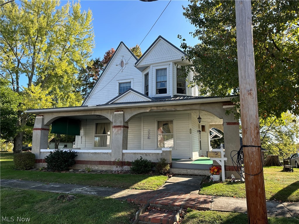 Beautiful Victorian Home featuring 4 spacious Bedrooms and 1 and 1/2 Bathrooms. This lovely home has been well maintained and owned by the same family since 1916! Wow! Home features original stain glass windows and beautiful Oak trim throughout the home with a welcoming gas log fireplace in the living room. Two Bedrooms have built in shelving / bookcases and one bedroom has built in nooks by the windows. Pretty cool attic on the third level adds additional living space or storage. This property includes a private driveway with 20 x 18 detached garage, and an additional 60 x 120 feet vacant lot included in the price. New Metal roof was installed in 2019. Come and sit on the front porch and you are home!  Frig, Stove, dishwasher, Washer and Dryer are all included. Schedule your appointment today !