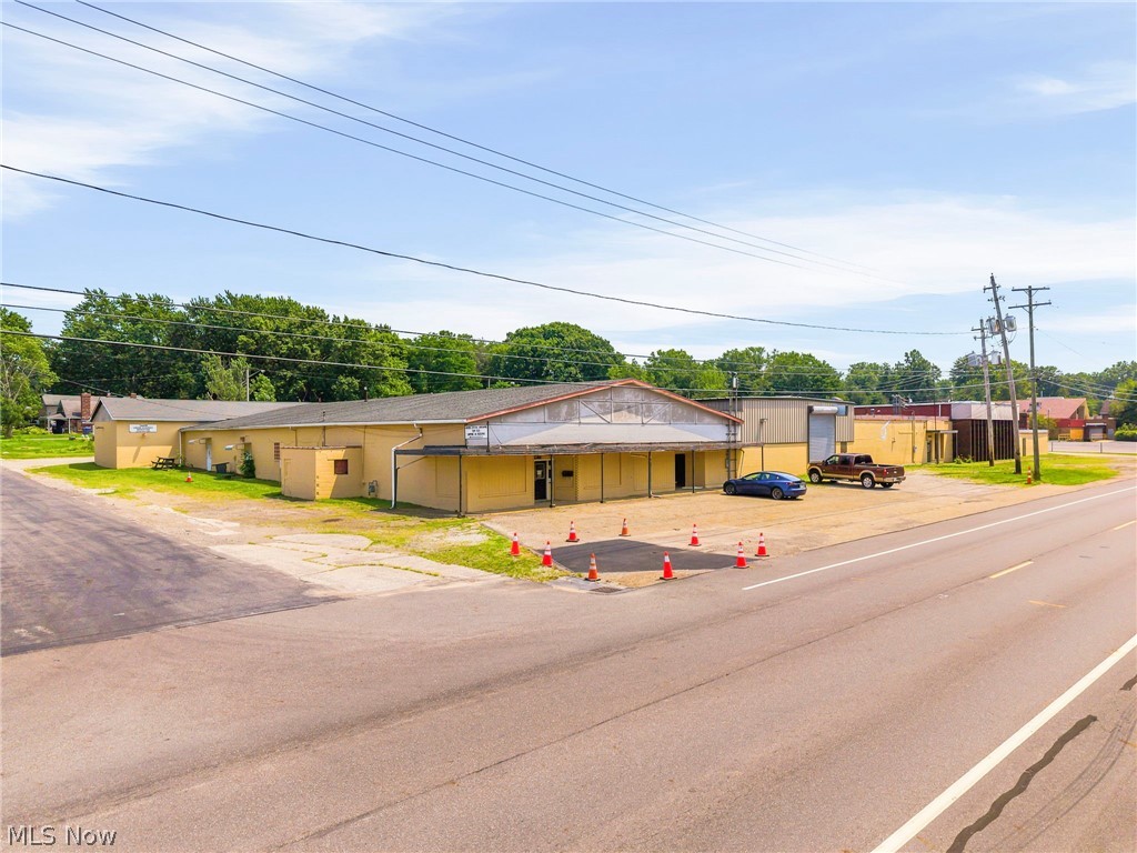 This is a great opportunity to acquire a spacious commercial building with over 37,000 square feet of versatile space on a 2.557-acre lot. Located on Massillon Road (State Route 241) with 312 feet of frontage, the property offers excellent visibility and accessibility.

The layout is ideal for various uses, suitable for single occupant or a multi-tenant setup. It includes two office areas creating more flexibility.

The property features multiple drive-in doors for easy loading and unloading, along with cranes (1/2 ton to 5 tons) throughout, accommodating many types of industries.