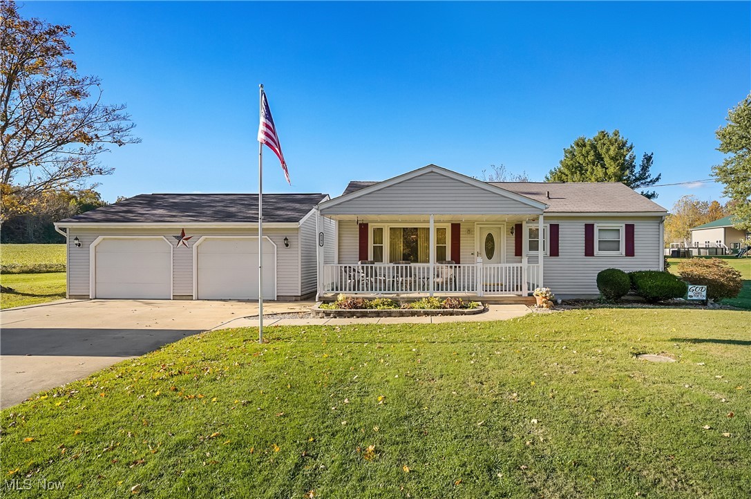 Welcome o your new address! This wonderful home has been exceptionally maintained by the same owners for many years! This ranch is a cozy, well maintained beauty! Great curb appeal!  The kitchen is nice sized and leads to a wonderful 24x14 covered deck  The family room is a wonderful surprise and it leads to the deck. There is another surprise....a very nice basement under the family room. You will love the finished garage with the concrete drive. So come, bring your swing and sit on the front porch and watch the world pass you by.