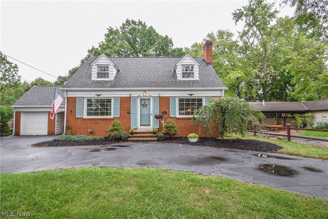 Attractive Berea Cape Cod ..... Stunning Curb Appeal .... Lots Of Charm And Character .... Large Park Like Lot .... 3 Bedrooms, 2 Full Baths .... Gleaming Hardwood Floors Throughout .... Spacious Rooms .... Beautiful Living Room With Cozy Fireplace .... Newer Windows And Roof .... Large Deck And Sun Porch Overlook The Sprawling Back Yard .... Full Basement .... Wrap Around Driveway .... Central Air ! .... Don't Miss This One !