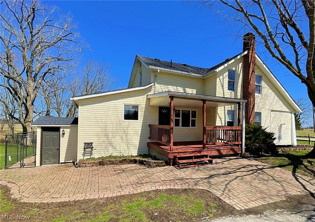 Come and see this beautiful three-bedroom, two full bathroom cape cod in the New Russia Township!  Sitting on 6.39 acres, with a creek running through the backyard, this is country living at its finest!  There are many fresh updates to this home.  The kitchen and bathrooms have been completely redone, the roof was replaced five years ago (on the house and the garage) and the HVAC was replaced last year!!  Another great thing about this property is the large three-car garage that has two extra rooms attached to it.  This one will not last long!  Hurry and schedule a showing today!