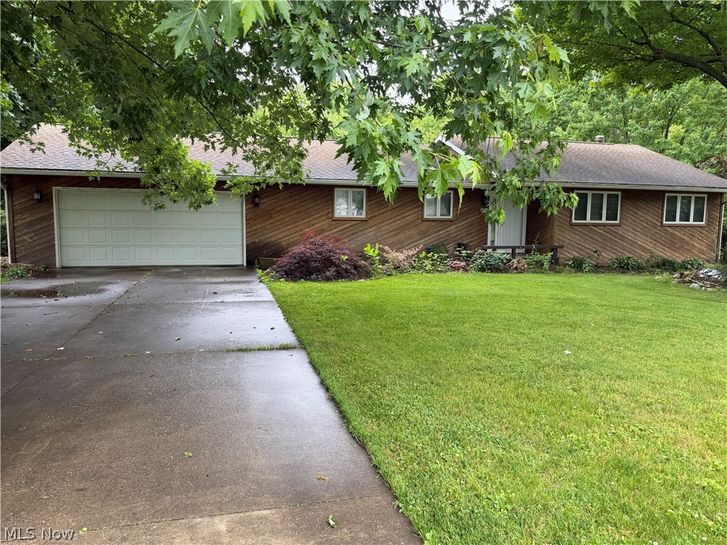 Welcome to this spacious 4-bedroom, 3 full bath home situated on a .48-acre lot with plenty of room to enjoy both inside and out. The home features a deck just off the dining room—perfect for outdoor dining, relaxing, or entertaining guests while overlooking the nicely maintained yard.
This property offers a functional layout with a finished walkout basement that includes a full bath and fourth bedroom, making it an ideal space for in-laws, guests, or a private teen suite. Additional highlights include a 2-car attached garage and a beautifully landscaped yard that adds to the home's curb appeal and provides a peaceful outdoor setting.
With generous living space and flexible options for multi-generational living, this home has so much to offer. Schedule your showing today and see all the possibilities this property has to offer.