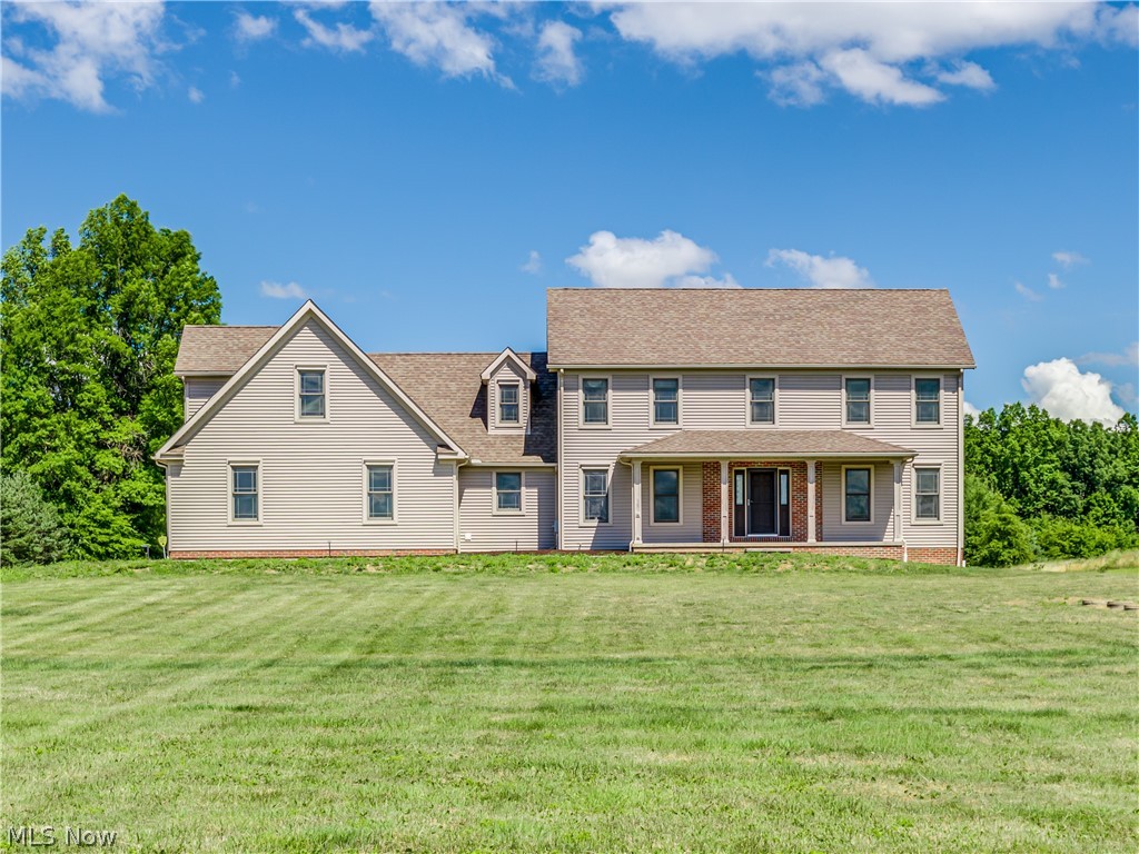 This is a quality built home that includes a 32 x 72 custom built barn with six stalls and is situated on 5 acres. The home offers 2.5 bath rooms, dining room, large eat-in kitchen with appliances, family room with gas fireplace, first floor laundry, master suite with walk-in closet, 2 bedrooms with jack and jill bathroom, mud room, full basement with garage access and an unfinished area over the garage that could be easily finished for a bonus room or master suite. The barn includes 6 stalls (10 x 12), tack area, water, upstairs hay storage with hay drops to stalls, drains, 200 amp electric, concrete floor and extra storage. There are two paddocks off of the stall, and all weather pen and 98 x 162 outdoor arena.