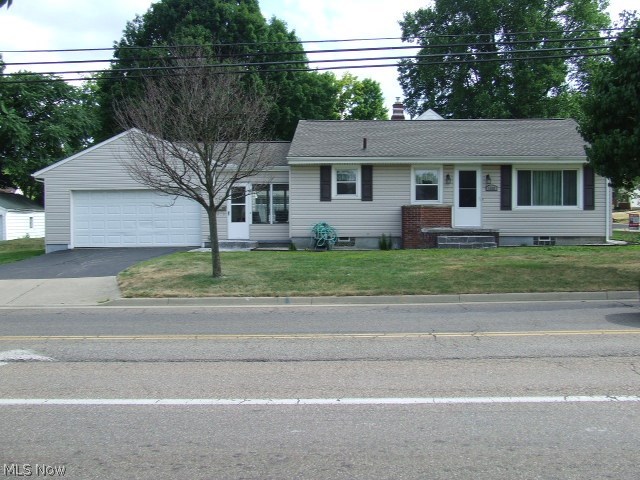 Updated Ranch would be a great starter home or perfect for downsizers!  Three bedrooms and living room have polished hardwood floors and ceiling fans.  Large kitchen has sunny eating area with chair-rail molding.  All appliances stay. Sun room connects to kitchen and garage and provides easy access to front and back yard. Full basement has half bath and glass block windows.  2 car attached garage with opener. New hot water heater. Move-in ready!