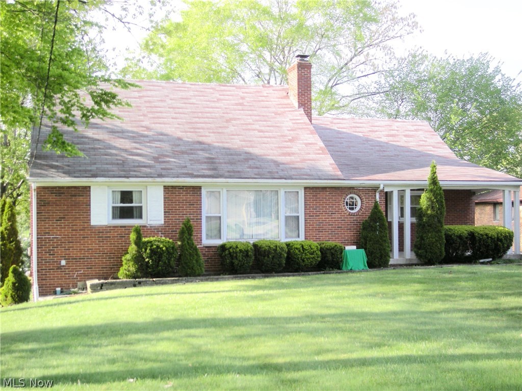 Oversized brick cape on well manicured lot, walk-out basement, large bonus room in basement, new hot water heater, newer furnace with central air, glass block windows in basement and updated windows throughout the house.  House needs updating and TLC.  There are foundation issues.  House is being sold "as is."  Owner will not make updates or repairs.