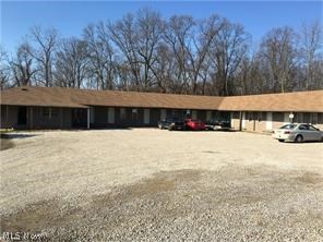 Rare opportunity to purchase 14 unit rental building in Medina, Ohio!  Great location on Pearl Road!  There are 2 each 2-bedroom apartments and 12 efficiency units.  All units are fully furnished and have been newly renovated!  Many repairs including windows, new roof, electrical upgrades, paint, new doors, concrete work, addition of on-site laundry facility, new decks, and much more have been completed!  17% cap rate!